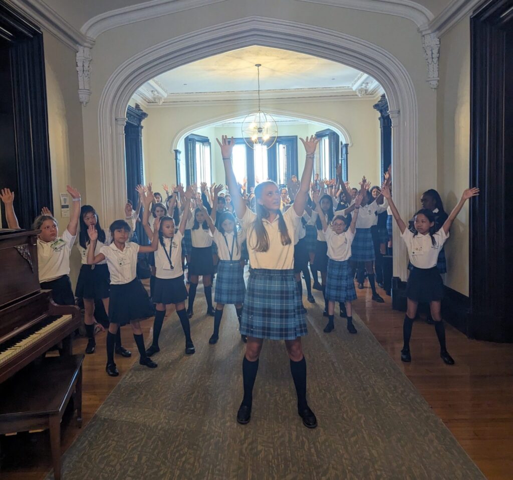 students dancing in hallway